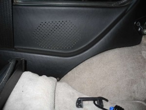 seat to the left; side window just above the speaker